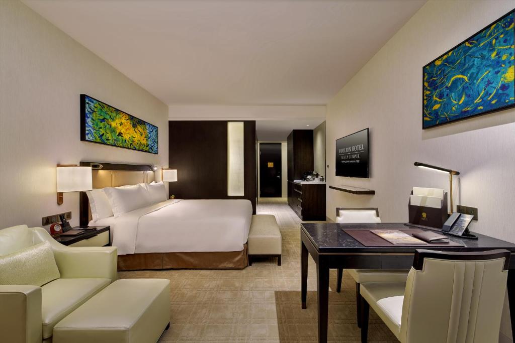 Postel nebo postele na pokoji v ubytování Pavilion Hotel Kuala Lumpur Managed by Banyan Tree
