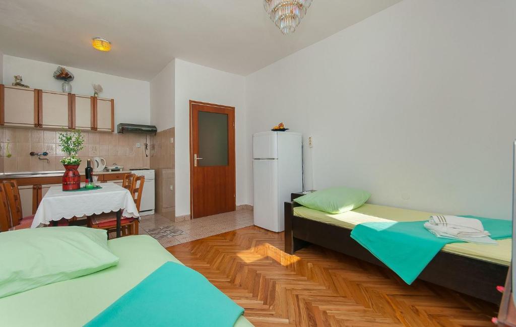 Posteľ alebo postele v izbe v ubytovaní Apartments Franka