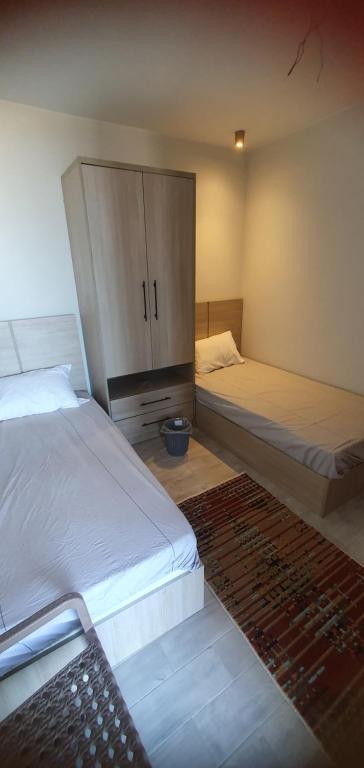 Postel nebo postele na pokoji v ubytování Duplex ilmonte galala