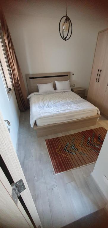 Postel nebo postele na pokoji v ubytování Duplex ilmonte galala