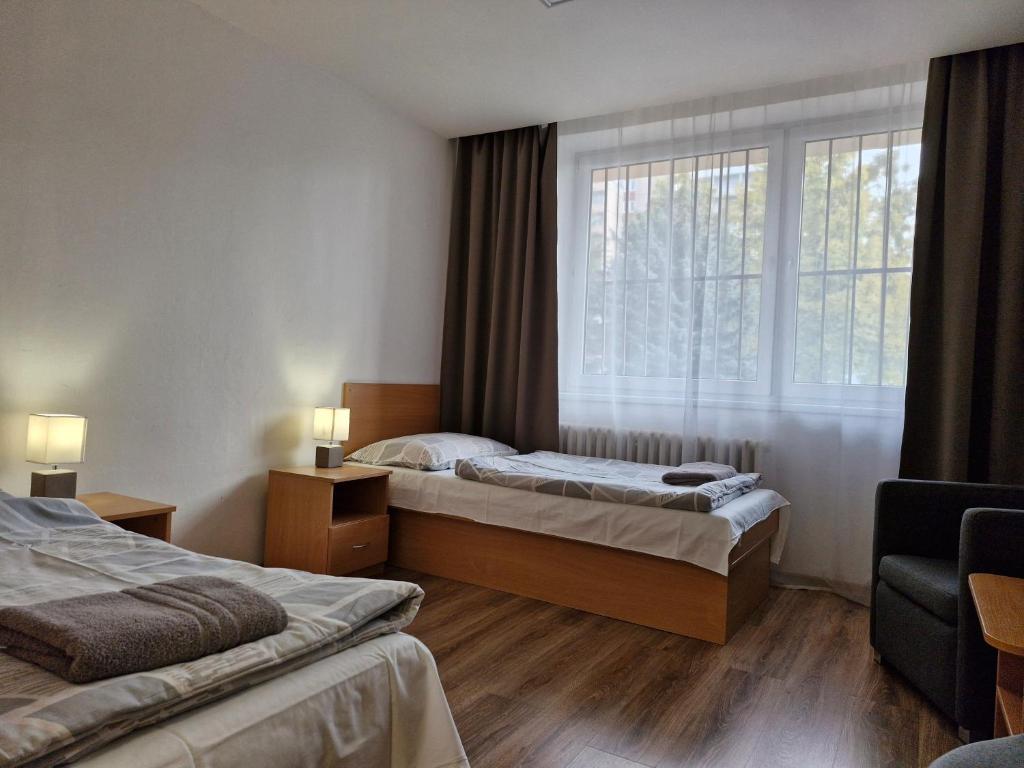 Postel nebo postele na pokoji v ubytování Studentsky domov B31