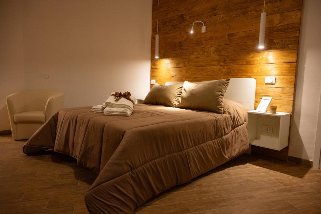 Postel nebo postele na pokoji v ubytování Chloè B&B