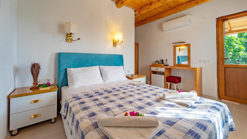 Кровать или кровати в номере St. Nicholas Pension