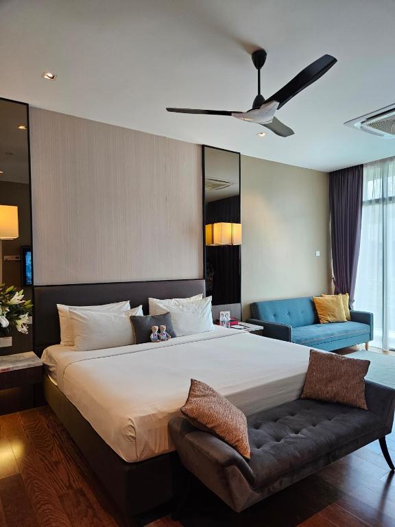 Voodi või voodid majutusasutuse The Langkawi Luxury toas