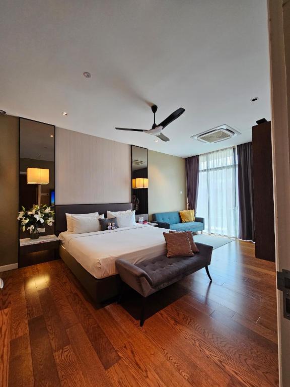 Voodi või voodid majutusasutuse The Langkawi Luxury toas