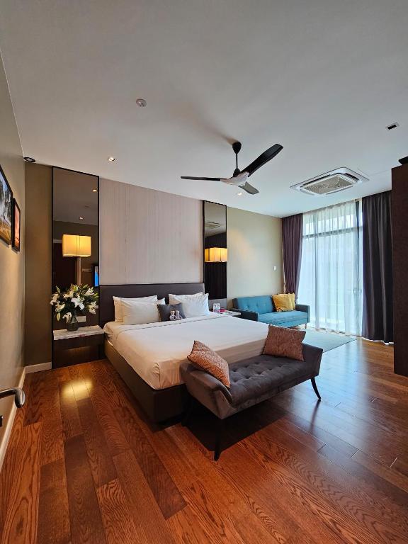 Voodi või voodid majutusasutuse The Langkawi Luxury toas