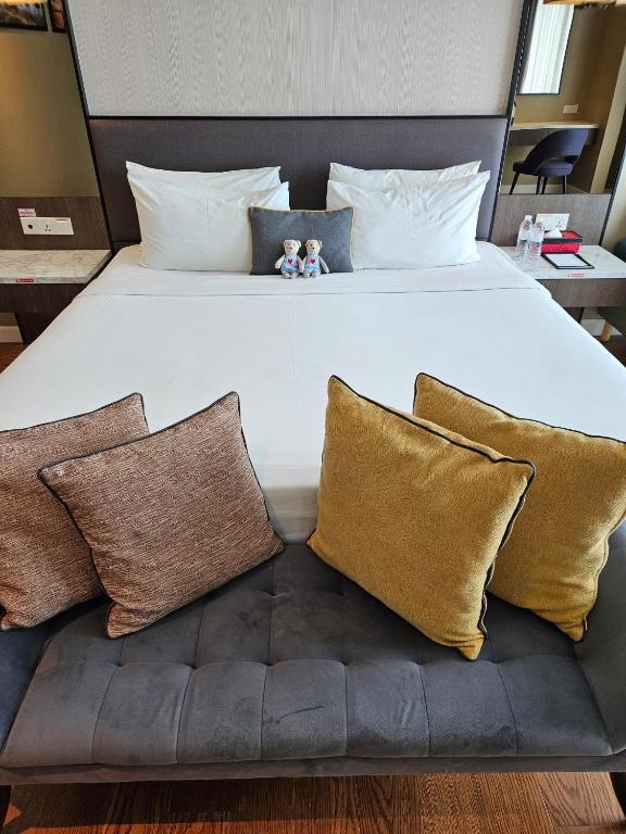 Voodi või voodid majutusasutuse The Langkawi Luxury toas