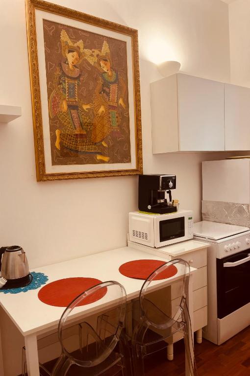 Kuchyň nebo kuchyňský kout v ubytování Casa Flora