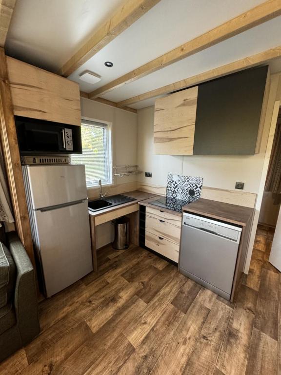 Kuchyň nebo kuchyňský kout v ubytování Camping Sérendipité
