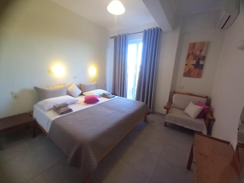 Postel nebo postele na pokoji v ubytování Natassa House 2