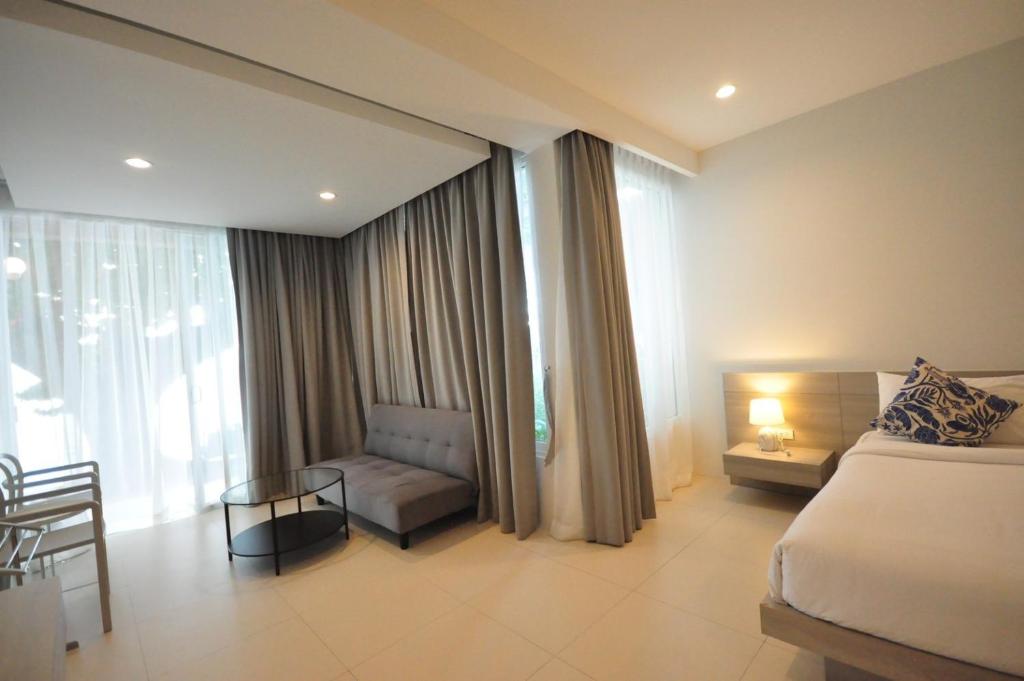 Postel nebo postele na pokoji v ubytování Baanfah Resort Samui