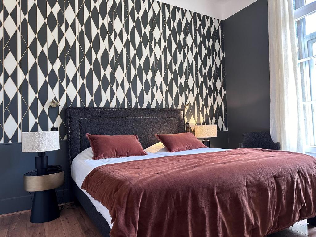 Postel nebo postele na pokoji v ubytování Le Grand Hotel