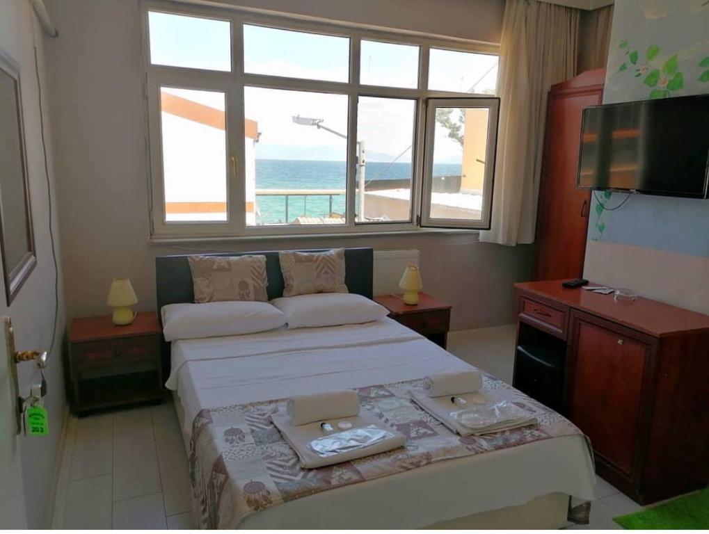 Postel nebo postele na pokoji v ubytování Hotel Mudanya