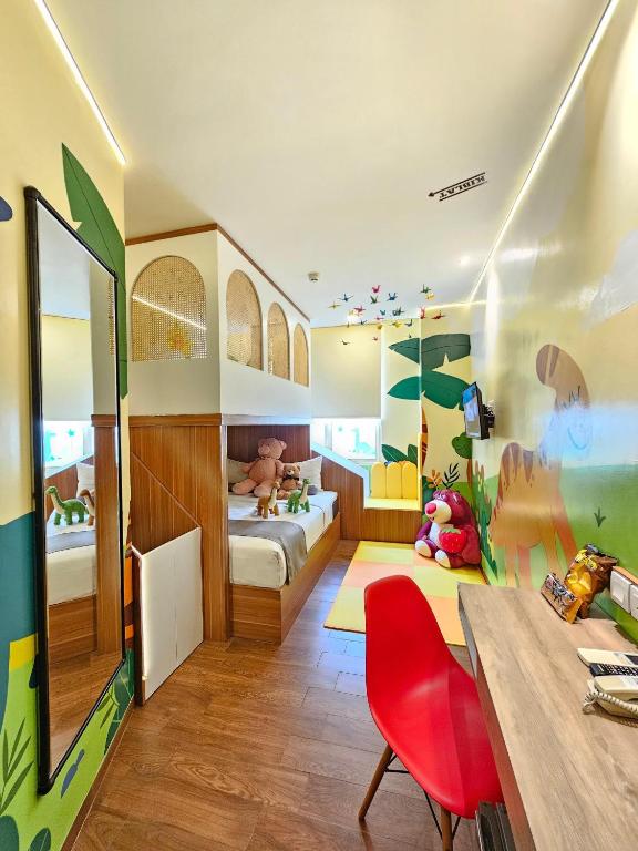 Postel nebo postele na pokoji v ubytování Hotel Fortunagrande Jember
