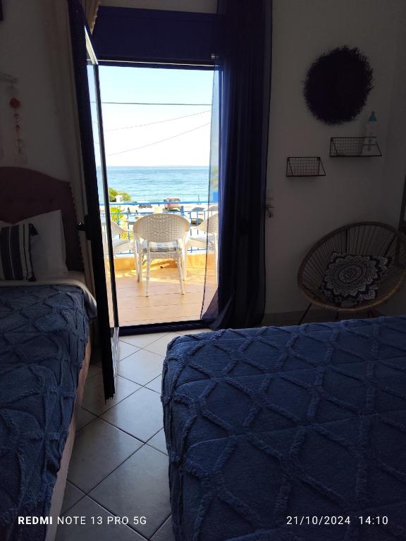 Postel nebo postele na pokoji v ubytování Mana mia Seaside Apartments