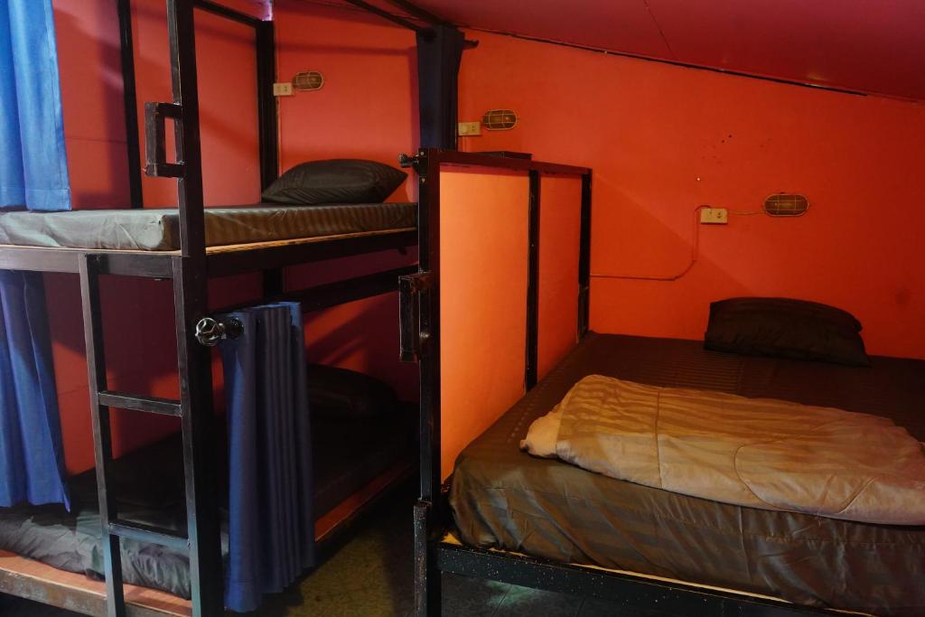 Postel nebo postele na pokoji v ubytování Paifah Bacpackers