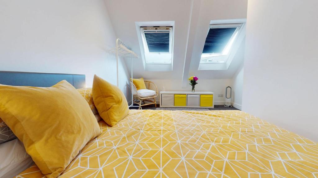 En eller flere senge i et værelse på St Ives Upper Loft