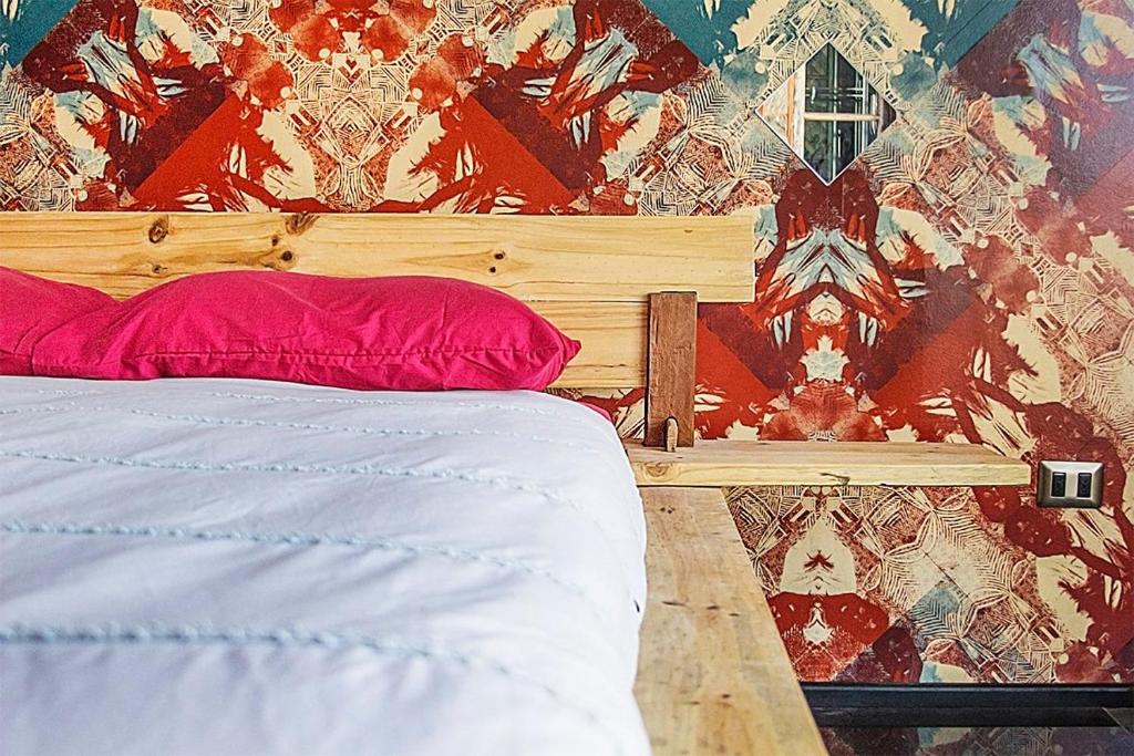 En eller flere senge i et værelse på PazZHOtel