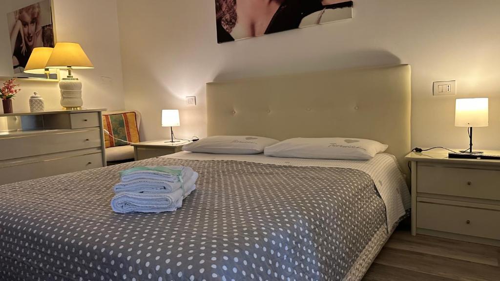 Postel nebo postele na pokoji v ubytování B&B Le Colombine