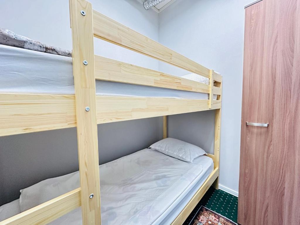 Center Capsule Hotel - Большая двойная комната
