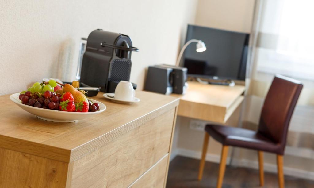 TV a/nebo společenská místnost v ubytování Villmergen Swiss Quality Hotel