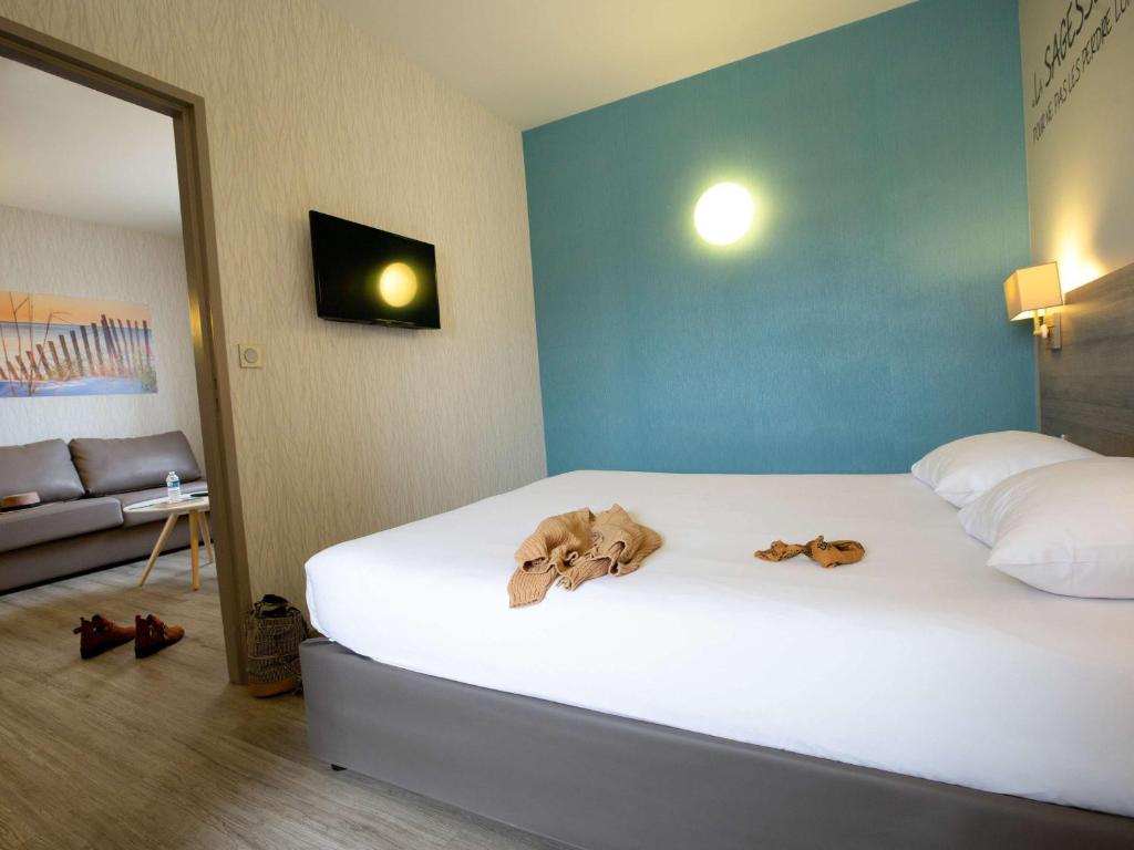 Postel nebo postele na pokoji v ubytování ibis Styles Vierzon