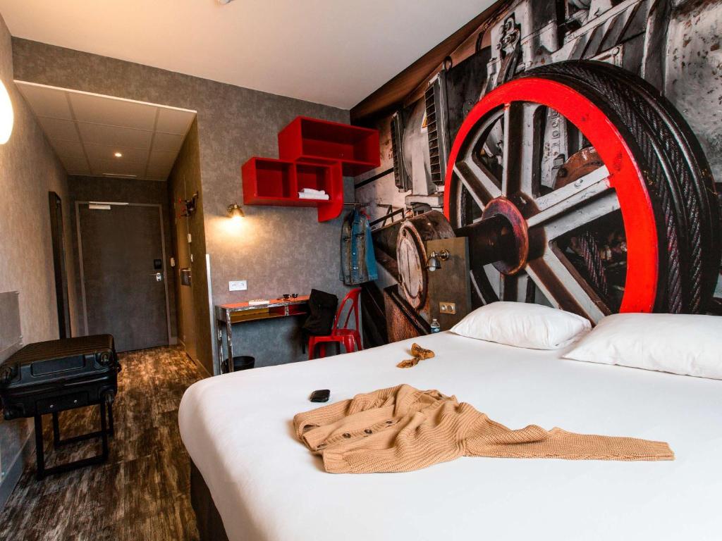 Postel nebo postele na pokoji v ubytování ibis Styles Vierzon