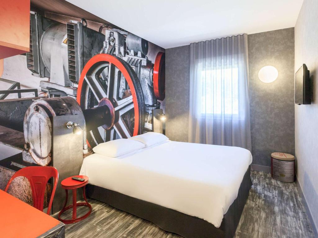 Postel nebo postele na pokoji v ubytování ibis Styles Vierzon