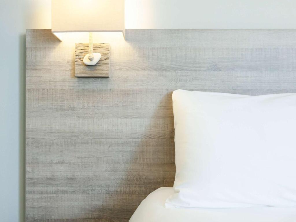 Postel nebo postele na pokoji v ubytování ibis Styles Vierzon
