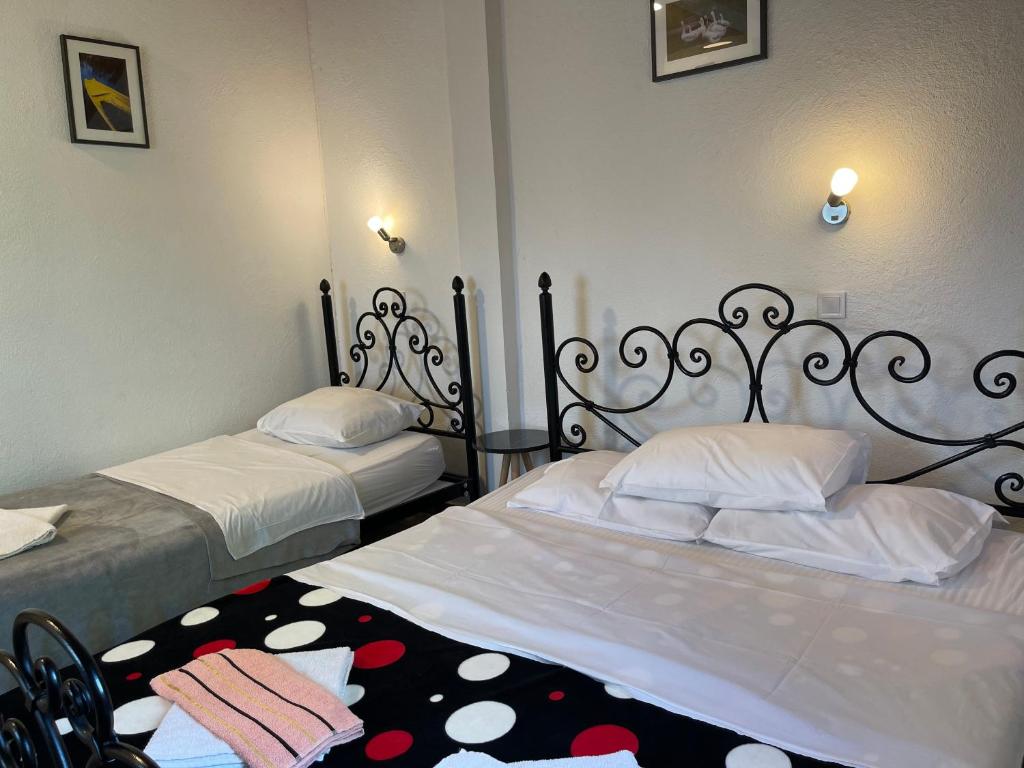 Postel nebo postele na pokoji v ubytování Skadar Lake Family Resort