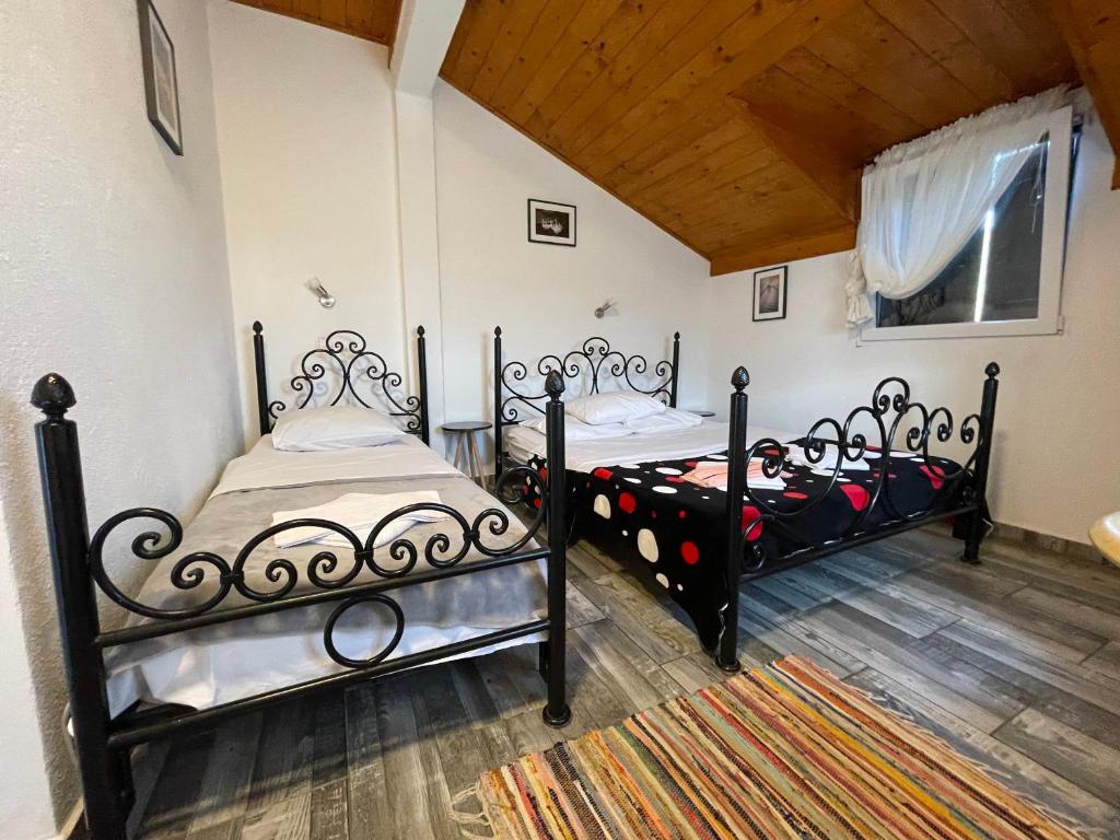 Postel nebo postele na pokoji v ubytování Skadar Lake Family Resort