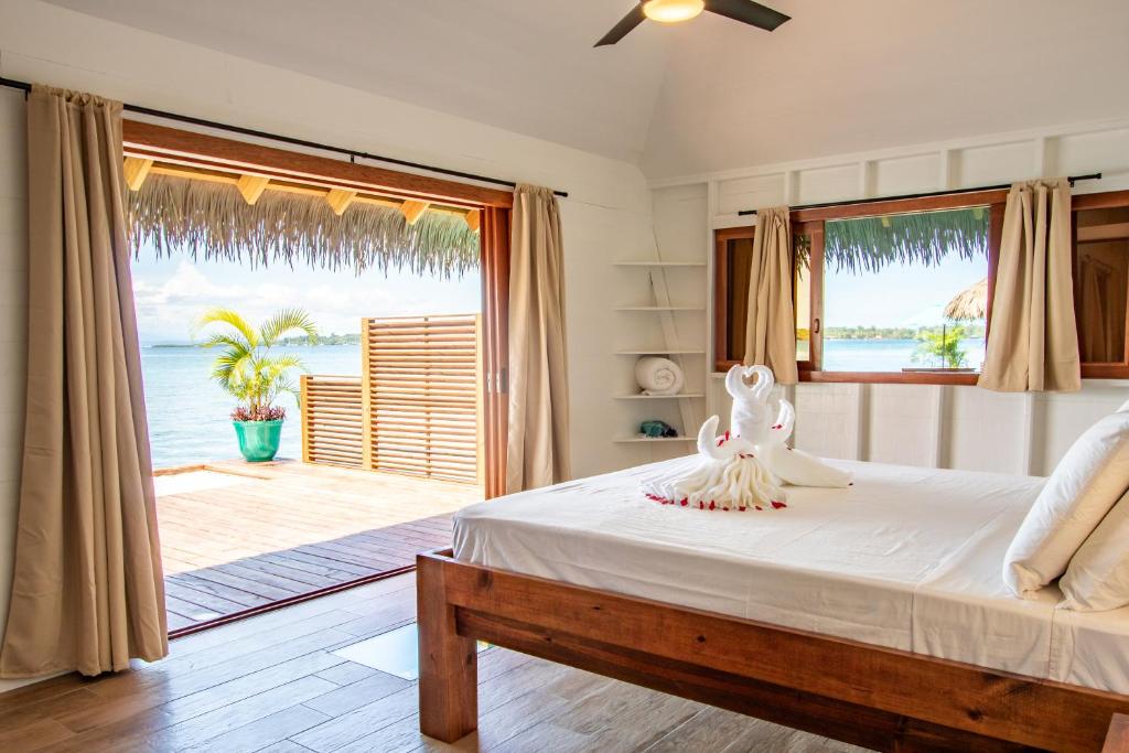 Postel nebo postele na pokoji v ubytování Sol Bungalows Bocas del Toro