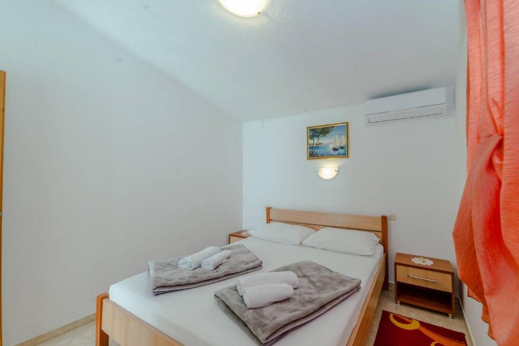 Postel nebo postele na pokoji v ubytování House Seagull