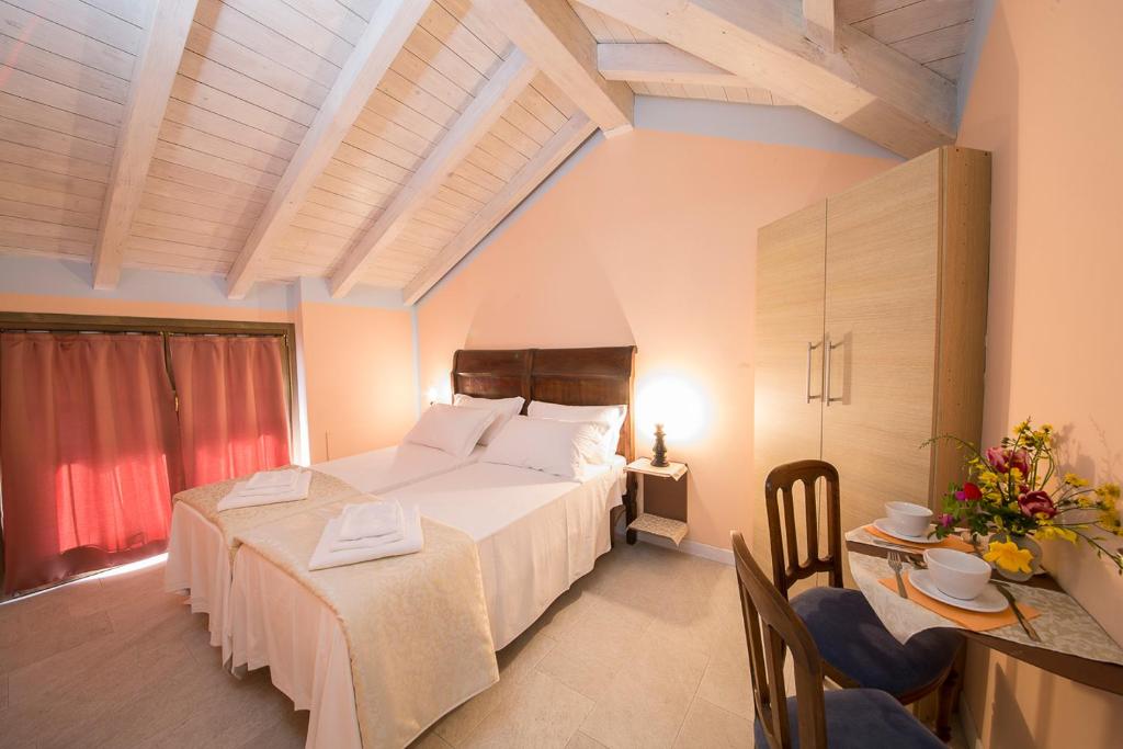 Postel nebo postele na pokoji v ubytování B&B Lambroriver