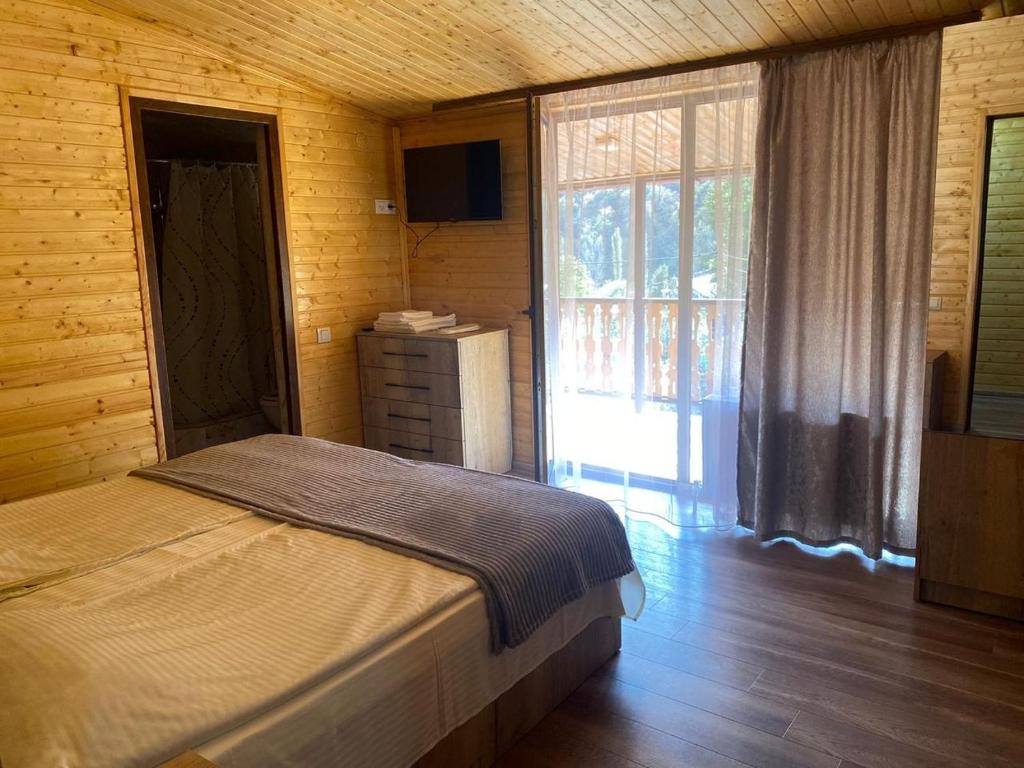 Postel nebo postele na pokoji v ubytování Dililuxe Hotel