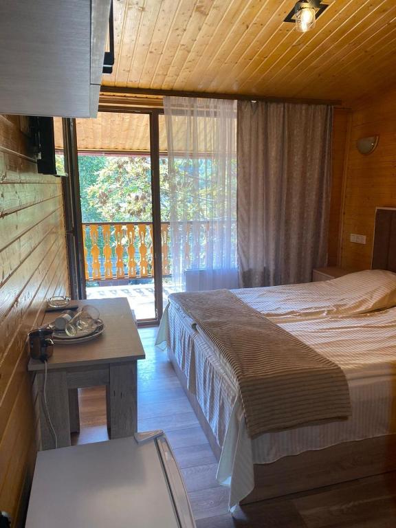 Postel nebo postele na pokoji v ubytování Dililuxe Hotel