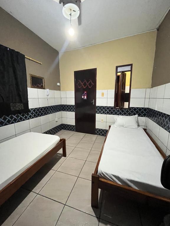 Postel nebo postele na pokoji v ubytování Monte Bello