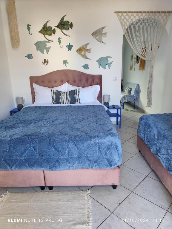 Postel nebo postele na pokoji v ubytování Mana mia Seaside Apartments