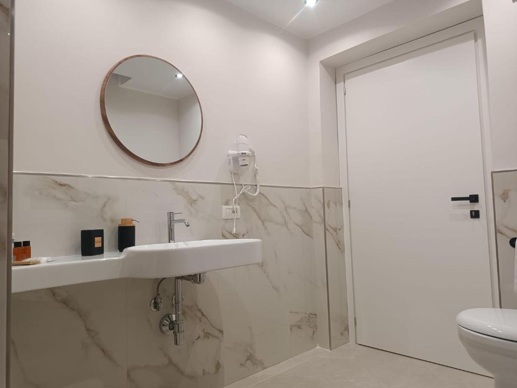 Koupelna v ubytování InCentro Elegant Rooms