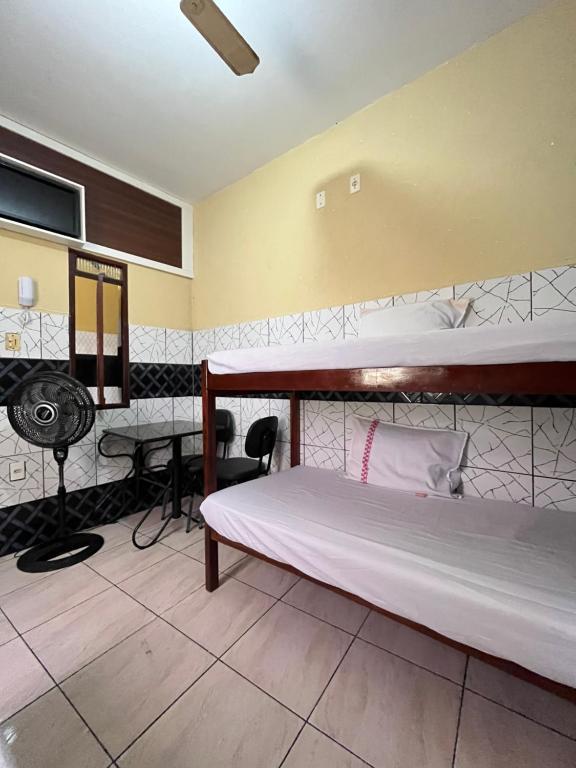 Postel nebo postele na pokoji v ubytování Monte Bello