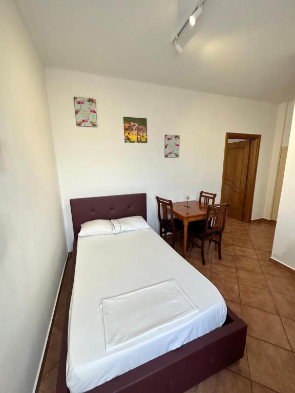 Postel nebo postele na pokoji v ubytování Anel Suites