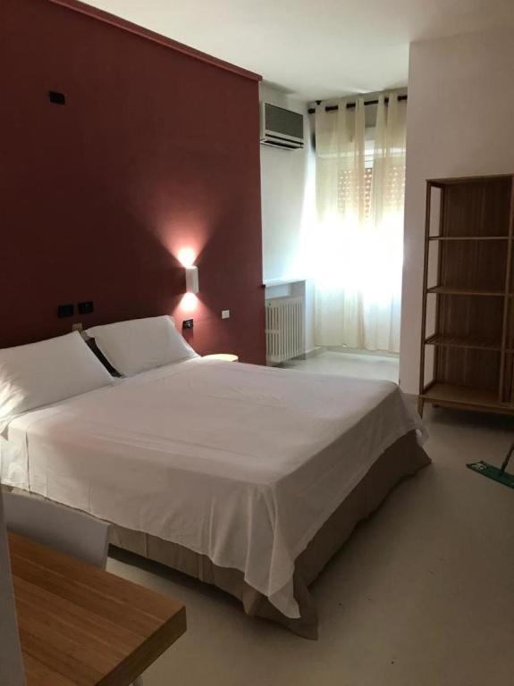 Postel nebo postele na pokoji v ubytování Riviera
