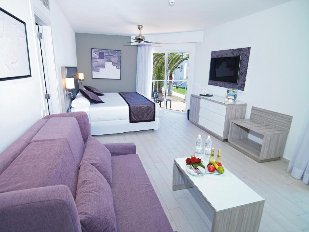 TV a/nebo společenská místnost v ubytování Hotel Riu Palace Meloneras