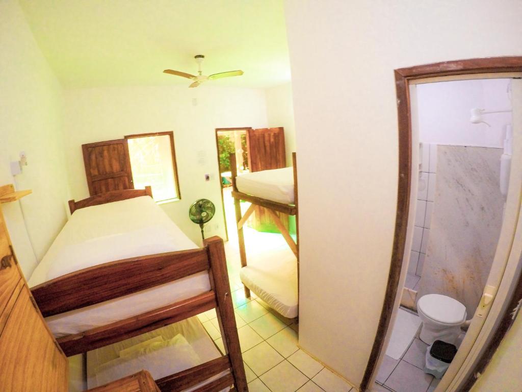 Cama ou camas em um quarto em Buddy's Hostel Itacaré