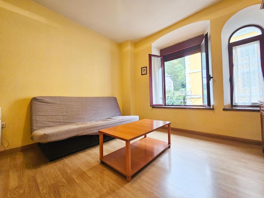 Postel nebo postele na pokoji v ubytování Apartamentos Canfranc 3000