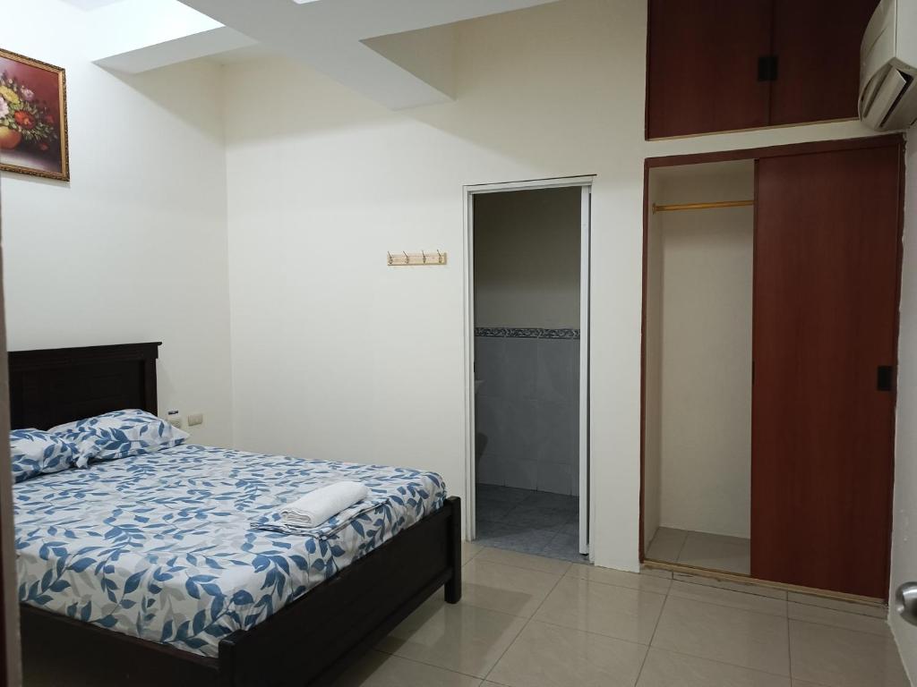 Postel nebo postele na pokoji v ubytování Hotel JIRA