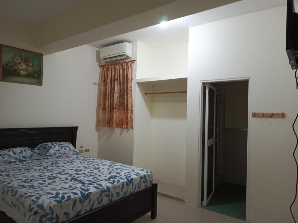 Postel nebo postele na pokoji v ubytování Hotel JIRA