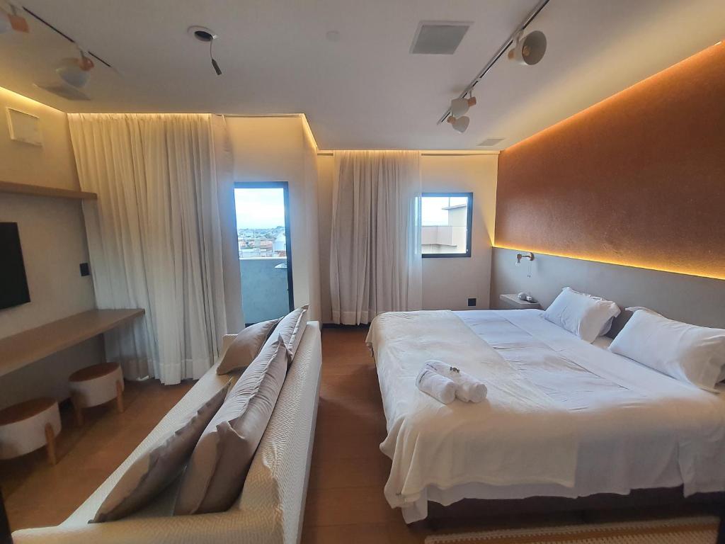 Postel nebo postele na pokoji v ubytování Theotókos Flats Apart-hotel