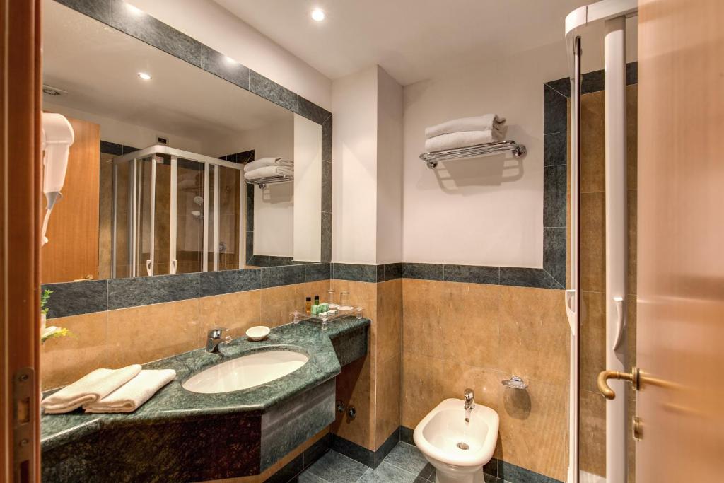 Koupelna v ubytování Hotel Impero