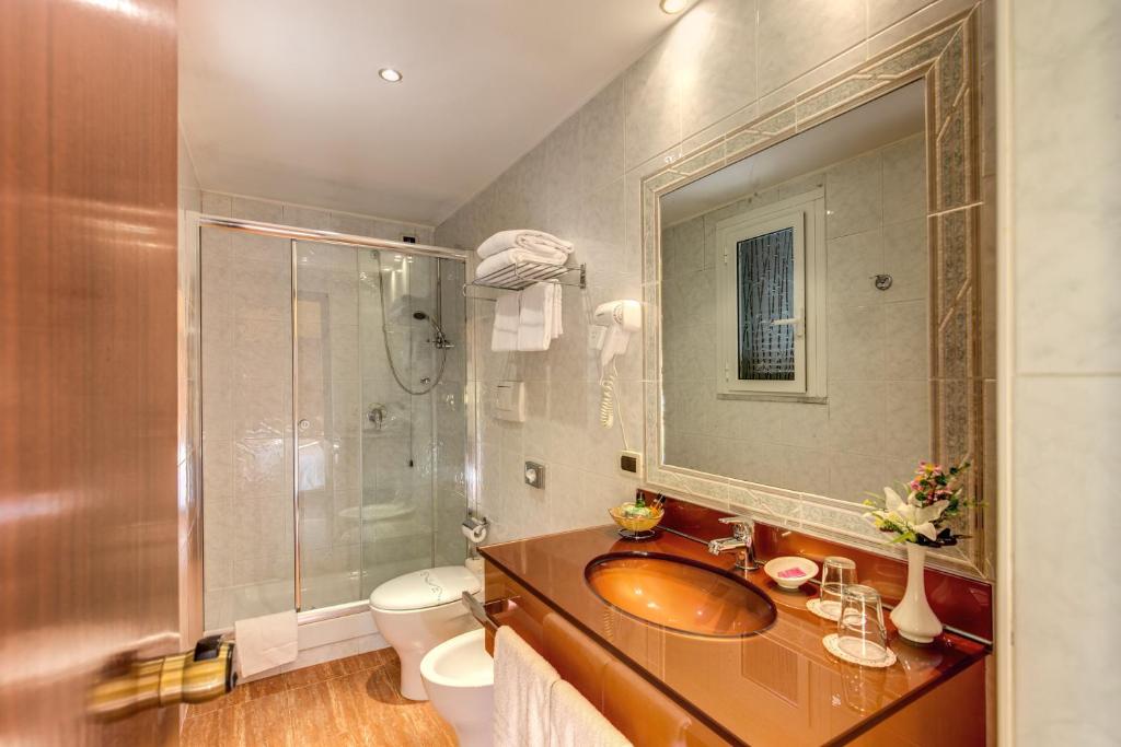 Koupelna v ubytování Hotel Impero